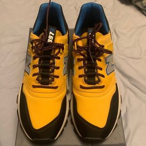 Yellow and black New balance 997s
